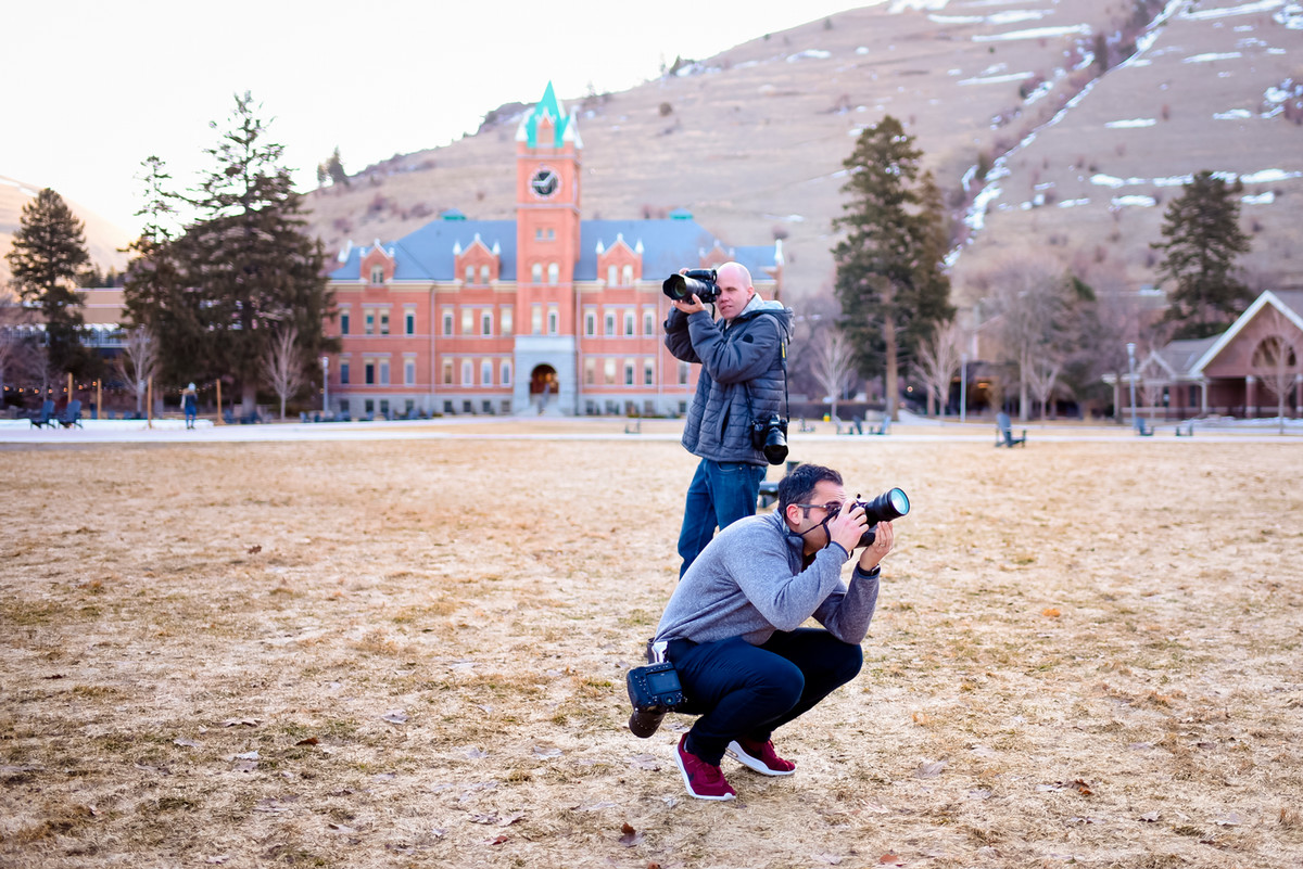 Martino and Brennecke take photos on the oval.